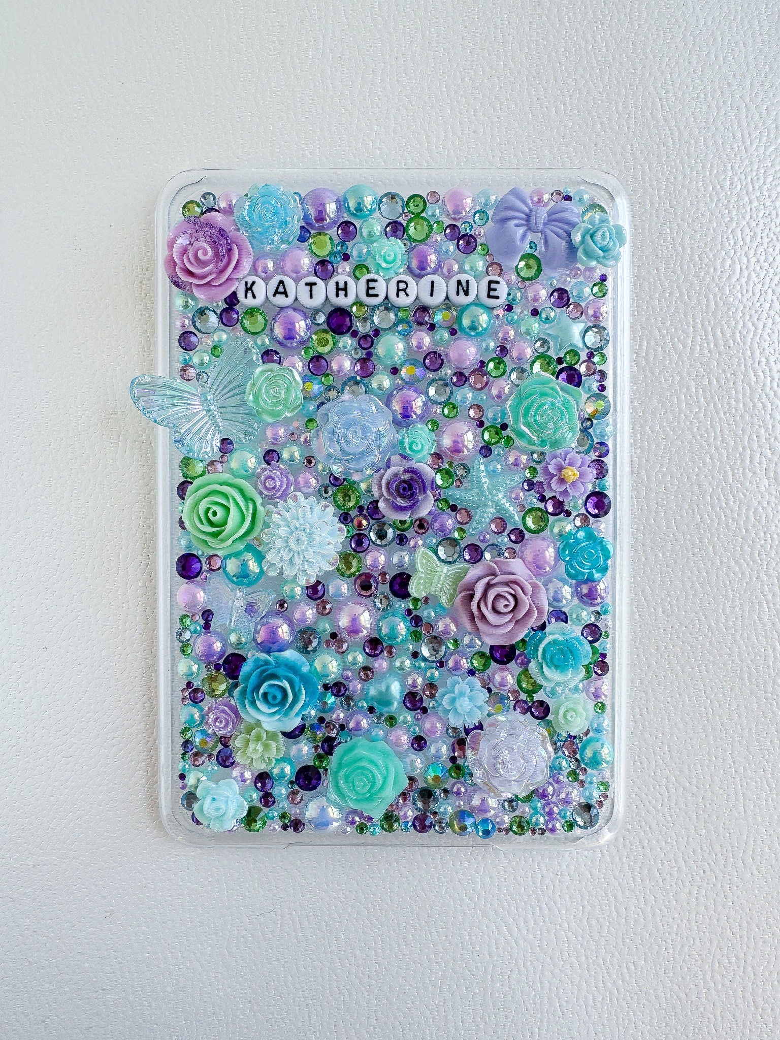 a phone case with a bunch of flowers on it